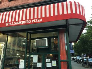 Front of pizzeria. at Williamsburg Pizza in New York City