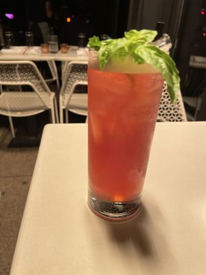 Non-alcoholic pomegranate drink with basil garnish at Sestina in New York City