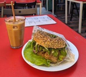 Iced latte and Ave seitan bagel 🥯 at Bajgle Króla Jana in Poznan