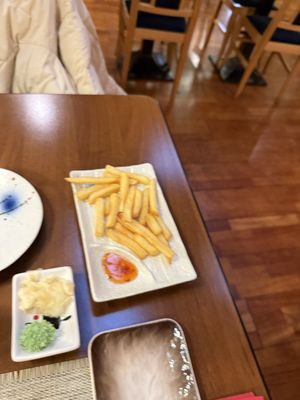 Pommes  at Sushi Queen in Trieste