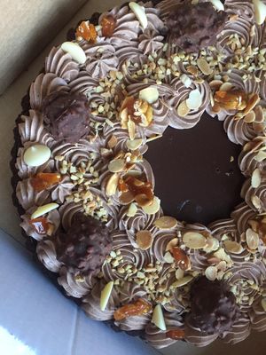 Beautiful decorations on top and 4 layers of biscuit and chocolate underneath at The Sunny Spoon in North London