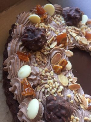 Chocolate buttons, nuts and chocolate bites on top at The Sunny Spoon in North London