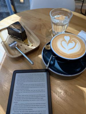 Coffee hazelnut cheesecake & oat milk latte!  at The Missing Piece in Hong Kong Island