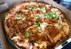 Build you own custom pizza with vegan pepperoni and jalapeños.  at Ozone's Brewhouse in Lansing