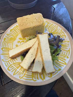 Sides of tofu and cornbread (gf)  at Peace Cafe in Honolulu