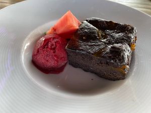 Orange brownie with cassis sorbet and watermelon at Downtown in Dordrecht