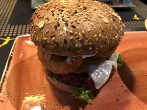Vegetarian Burger with online rings  at Peter Pane in Stuttgart