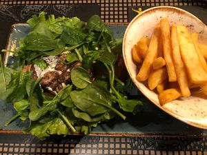 vegan burger “Trüffelfee” without bun, with side of fries   at Peter Pane in Stuttgart