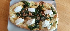 Spinach and Artichoke Pinsa at Tolstoy in Vienna