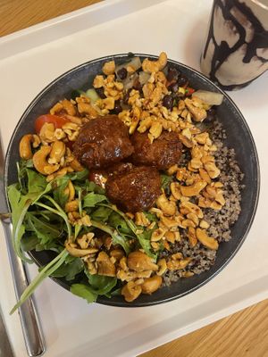 Quinoa, signature meatballs, salad, roasted peanuts and chipotle sauce  at Tolstoy in Vienna