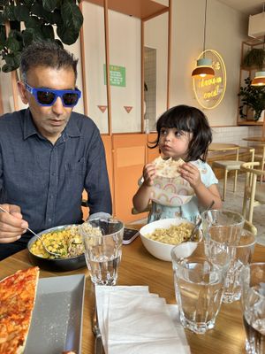 Curry bowl and vegan pizza and Mac   at Tolstoy in Vienna