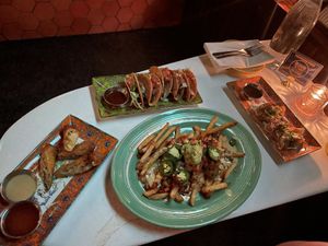Egg rolls, dumplings, loaded fries, tacos  at Pearl Diver in Nashville