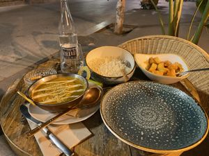 Curry w/ tofu, chickpeas & spinach. Rice. Patatas Bravas   at Cinnamon in Sitges