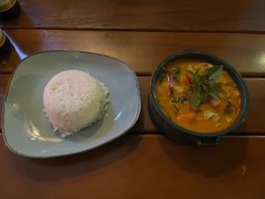 red thai curry with vegetables and rice  at All Reis in Vienna