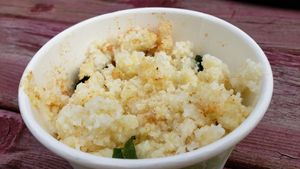 Grits. Comes with breakfast platter. Swimming in olive oil.  at Veganista in Minneapolis