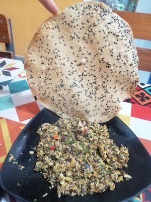 nấm xào sả ớt + bánh tráng at An Am Thuc Chay in Tam Ky