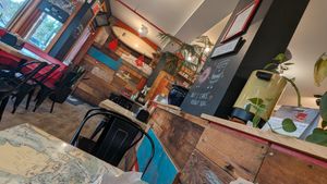 The photo shows the restaurant seating area with beautiful decorations. at Rhino Coffee House in Tofino