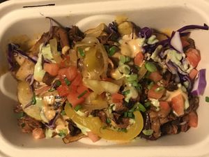 Loaded fries with oyster mushroom at VegainzLA - La Brea in Inglewood