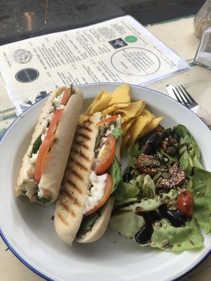 Vegan Mozzarella, pesto, tomato and spinach panini  at Baobab in Banff