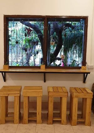 Counter bar with garden view at Veggie Lover Cafe in Vientiane