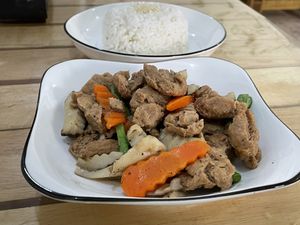 Fried pork with black pepper (25,000 kip) with steamed rice (10,000 kip).  at Veggie Lover Cafe in Vientiane