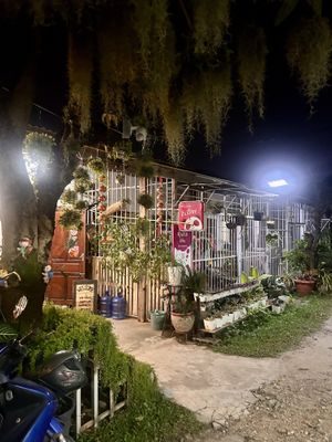 Outside of restaurant- it’s down a side street off the main road and then left down a little alleyway   at Veggie Lover Cafe in Vientiane