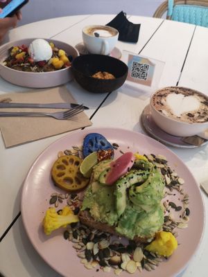 Avo toast with scrambled tofu, pancakes and hot chocolate with oat milk. at Brunch & Cake - Rosselló in Barcelona