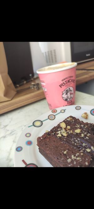 Brownie + pistachio ice cream takeout at Kinoa in Malaga