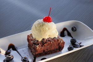 Vegan brownie with vegan vanilla icecream, you cant believe the taste! at Version Vegana in San Andres Cholula