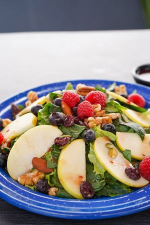 The one that never miss! a fresh salad with berries and nuts! at Version Vegana in San Andres Cholula