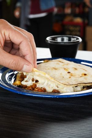 "Mulalá"
Seitan (beef style) based quesadilla with plant based chorizo and guacamole! at Version Vegana in San Andres Cholula