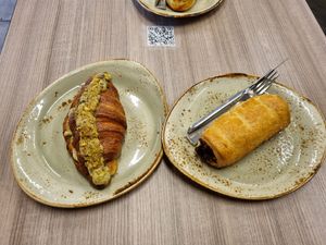 Vegan pistachio croissant + vagan sausage roll at Element Cafe in Calgary