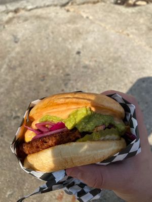 I loved their burger! Loaded with vegan cheese guac sauce and coleslaw at Never Caged in Los Angeles