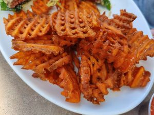 Sweet potato waffle fries, dip in the vegan nachos! at Sedona Beer Company in Sedona