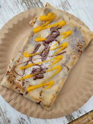 Der Tropical Crêpes mit Bionella, Mangosauce und Kokosraspel at Strandcreperie in Scharbeutz