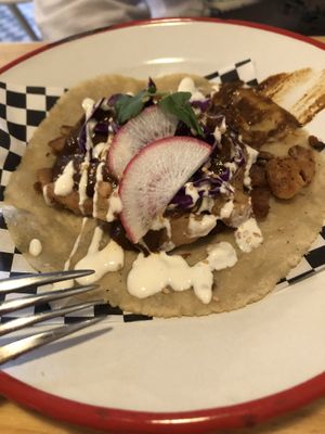 Taco with mole   at Taqueria La Lupe in Sevilla