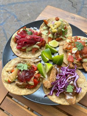 Vegan taco selection for sharing. at Taqueria La Lupe in Sevilla