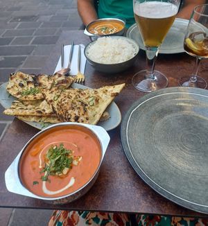 Tofu tikka masala, tofu pea curry + rice and naan bread at Garlic n Greens in Bruges