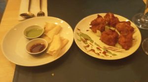 Padadum and onion bahjee for starters: tasteful! at Garlic n Greens in Bruges