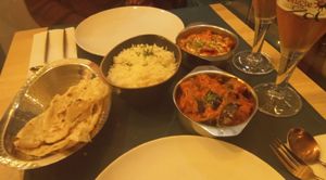 Mains: two curry's with rice and garlic naan. Rich and deep flavour! at Garlic n Greens in Bruges