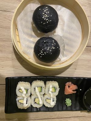 Black bao buns with beyond meat filling, avocado sushi   at Linh - Not Just A Restaurant in Prague