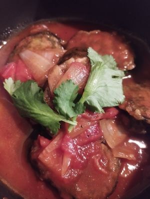 Fish in tomato sauce at Linh - Not Just A Restaurant in Prague