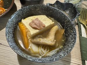 One of the many bowls of hot pot i had with noodles, tofu, mushrooms, vegan meat, carrots and more  at Linh - Not Just A Restaurant in Prague