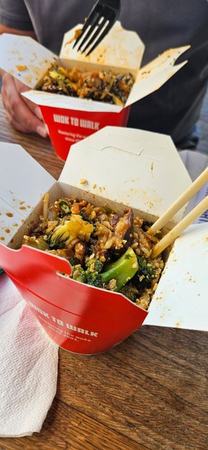 Mine: udon noodles with tofu, shiitake mushrooms, broccoli, teriyaki sauce, and peanuts.
Other: udon noodles with tofu, shiitake mushrooms, pak choi, Szechuan sauce, and sesame at Wok To Walk - Damstraat in Amsterdam