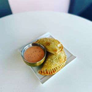 “Cheeseburger” Empanadas with special sauce.  at Cyth & Co in Oakland Park