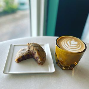 Chewy chocolate chip cookie & oat milk Cortado.  at Cyth & Co in Oakland Park