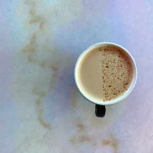 Chai steeped 48 hours in oat milk and garnished with cinnamon. at Cyth & Co in Oakland Park