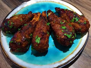 BBQ “Chicken” Wings on a succulent, sweet sugar cane bone at Jam Delish in North London