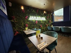 LED neon embedded in plastic flowers 💐   at Jam Delish in North London