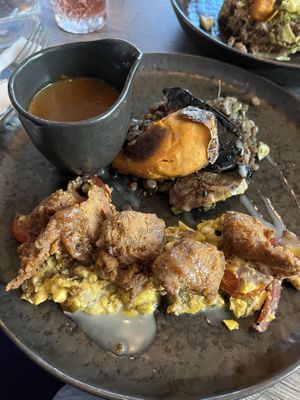 Jerk chicken with gravy  at Jam Delish in North London